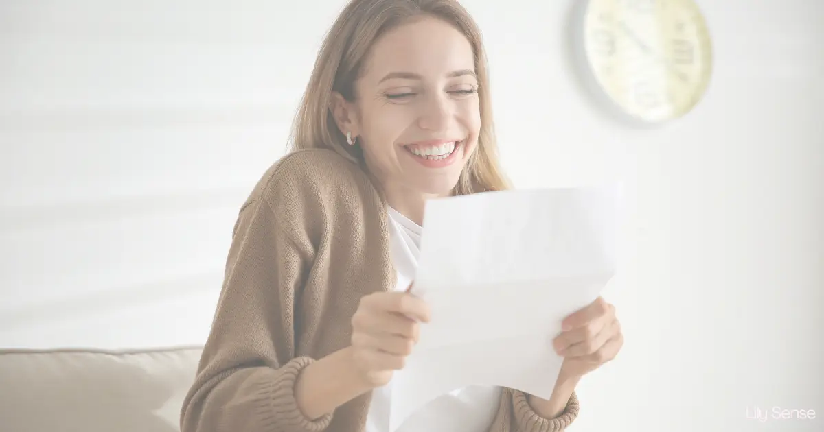 A woman excited at receiving a letter